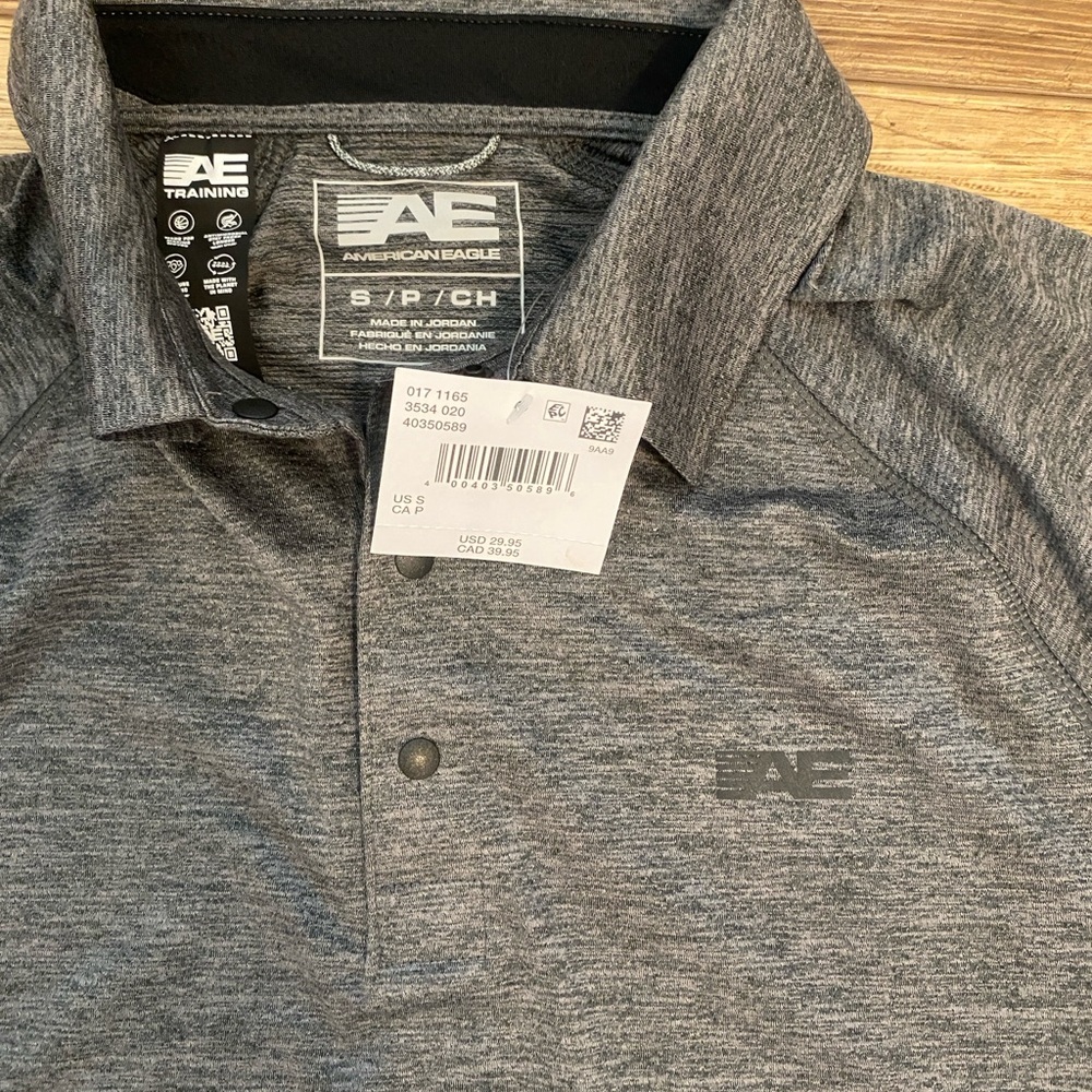 NWT American Eagle Charcoal Training Polo Shirt
Men's size Small - Picture 3 of 4